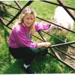 A young Jo with baby lamb