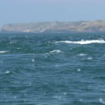The Wildgoose tidal race north west of Skolkholm with Skomer in Looking north through Jack Sound from near Skolkholmthe background.